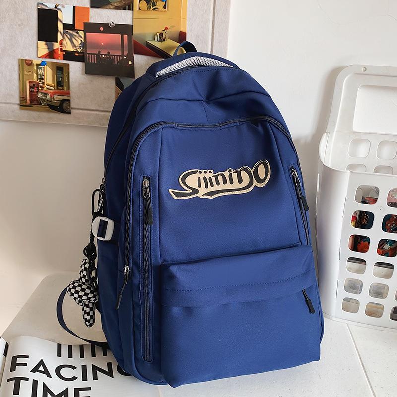 School bag Elementary school student Junior high school student High school student College student Female large capacity burgundy men's backpack