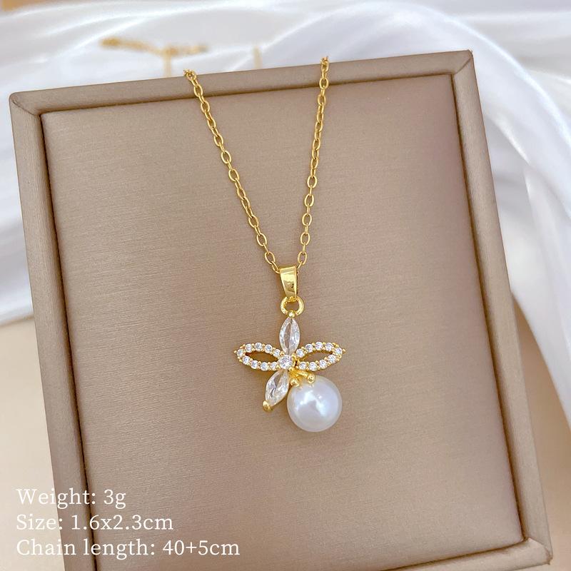 

Комплект ожерелья и серег Легкая роскошь Полный бриллиантов Цветок Жемчуг Индивидуальность Темперамент Банкетные серьги Набор предметов