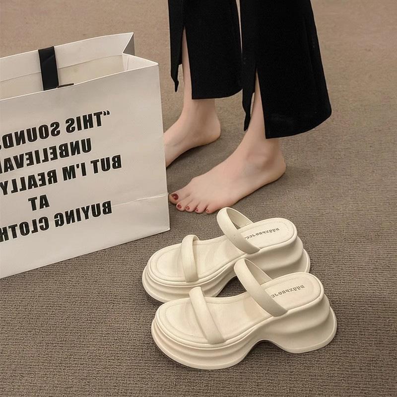High sense of advanced heightened thick-soled cool slippers women wear small sandals in summer casual beach shoes wedge heel one-word drag