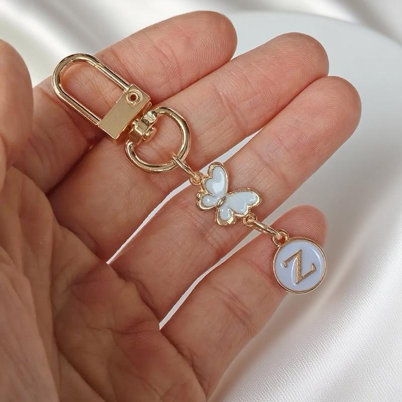 Metalowy Brelok z Literą Motyla A-Z 26 Liter Brelok Urok Uchwyt na Klucze Samochodowe Zawieszka do Torby Akcesoria Biżuteria Prezent