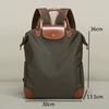 Women's Nylon Backpack Lightweight Large Capacity Versatile for Daily Commute Travel Laptop Minimalist Stylish Design