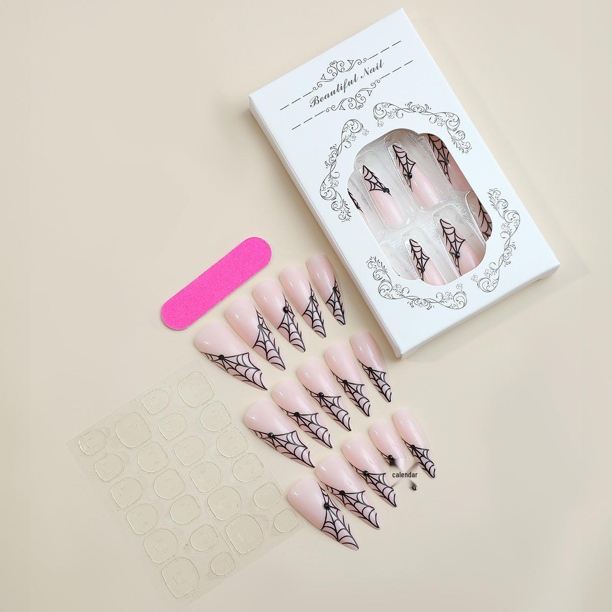 

Темный стиль длинные заостренные накладные ногти со стразами в виде паутины