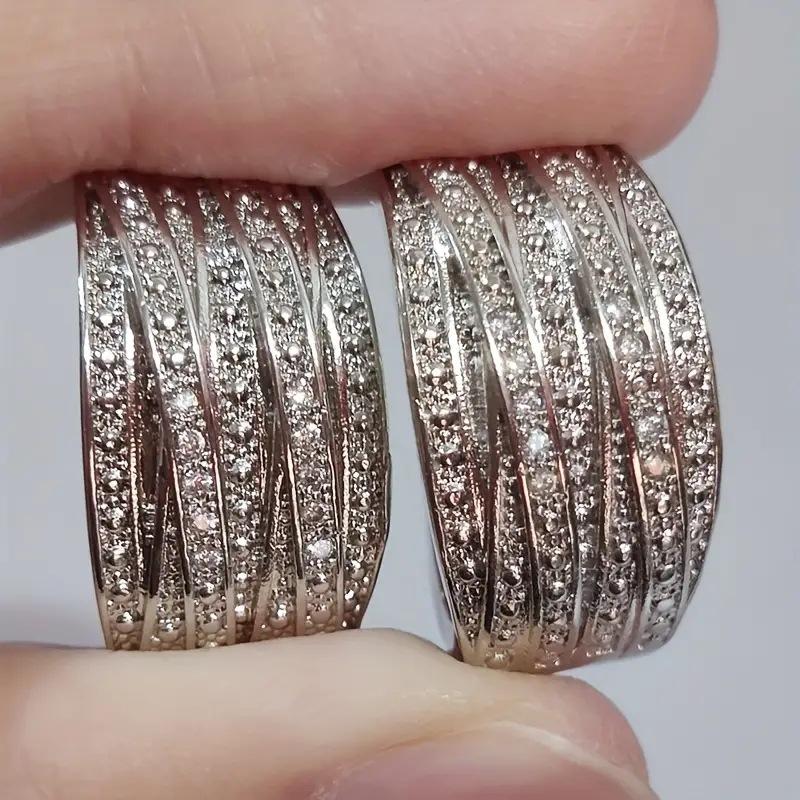 2026 New High End European and American Design Ear Buckle, Niche Personality Inlaid Zircon Fashion Zircon Accessories