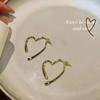 Simple and cold wind Metal love earrings Versatile design cross peach heart earrings Femininity advanced earrings