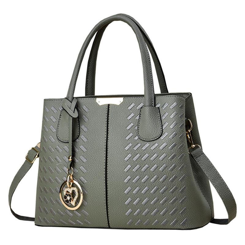 Stilvolle grenzüberschreitende Tragetasche mit gestickten Details für Mütter mittleren Alters