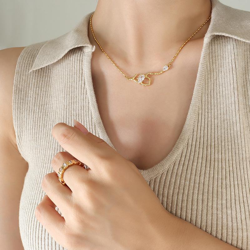 Celebrity-Inspired Gold-Plated Titanium Steel Necklace with Zircon Root-Shaped Pendant