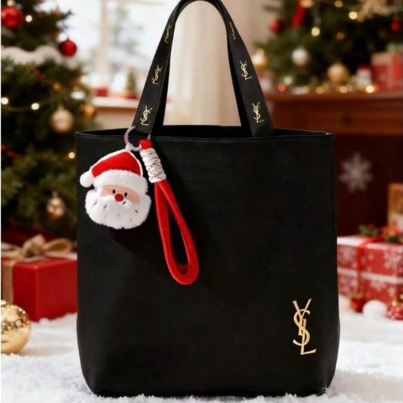 Schwarze Canvas-Umhängetasche von YSL, mit einem ultra-minimalistischen Design und großem Fassungsvermögen, geeignet für Arbeit, Shopping, Schule und Reisen.