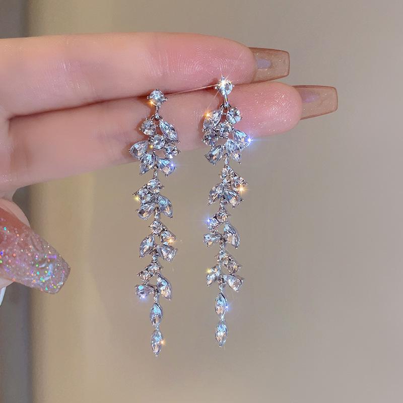 High-End Leaf Design Rhinestone Tassel Earrings for Women - Unique, Luxurious, Niche Dangle Studs.