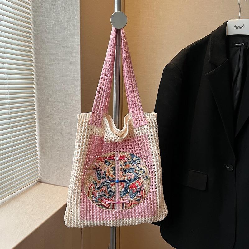 

Popular large-capacity woven tote bag women s new commuter seaside vacation style shoulder armpit bag рожевий