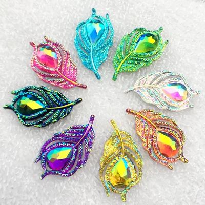 Brandneue 10 Stück stilvolle Kristall-Rhindiamonds mit flacher Rückseite, Blatt-Sammelalbum, 20 x 38 mm, handgenähte Feder-Edelsteine