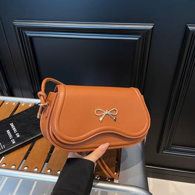 Nouveau sac bandoulière messenger décontracté design de niche couleur unie à la mode avec nœud haut de gamme