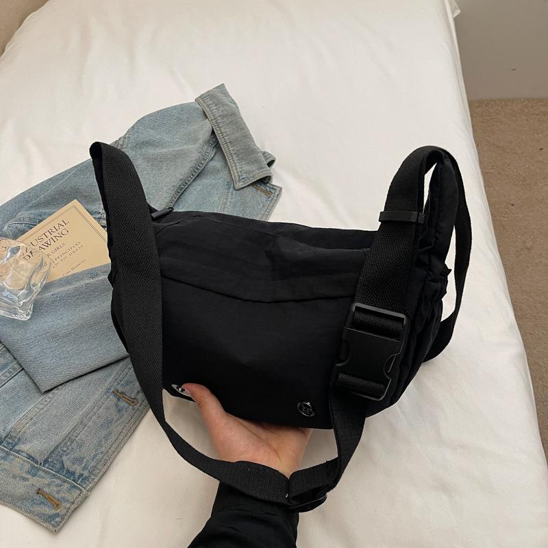 Korean version of casual nylon canvas bag women's 2025 new simple dumpling bag versatile shoulder messenger bag