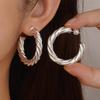 Elegant Twisted Line Earrings for Women: Stylish Gold & Silver Ear Cuffs with Unique Niche Design, Perfect for Commuting & Light Luxury Wear.