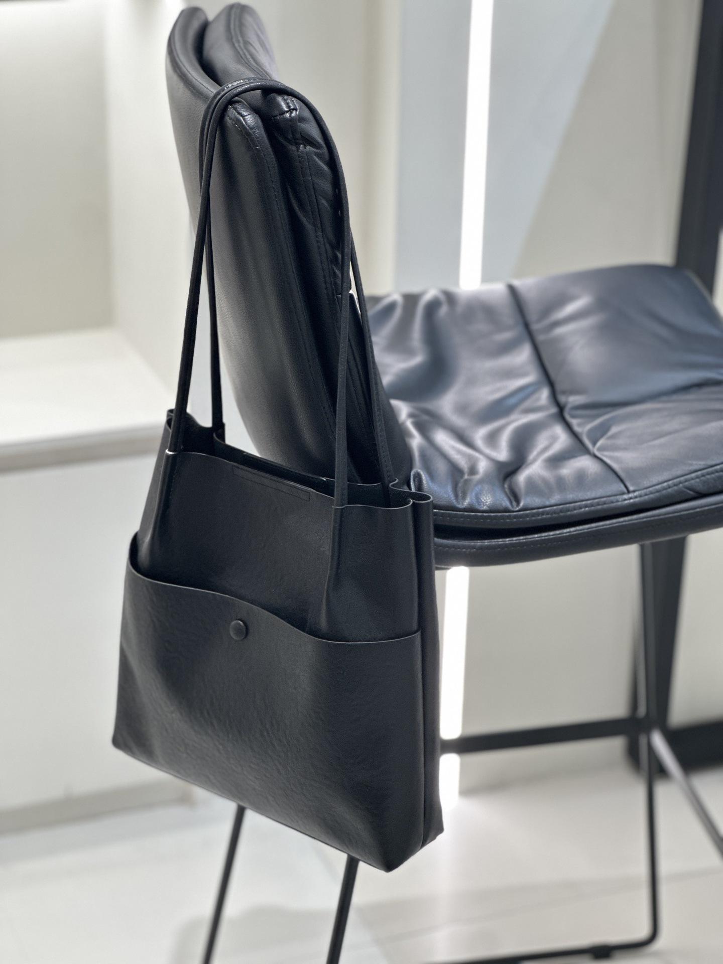 

Женская сумка-ведро премиум-класса Baidi из натуральной кожи с фактурным верхним слоем из коровьей кожи. Большая вместимость. чёрный