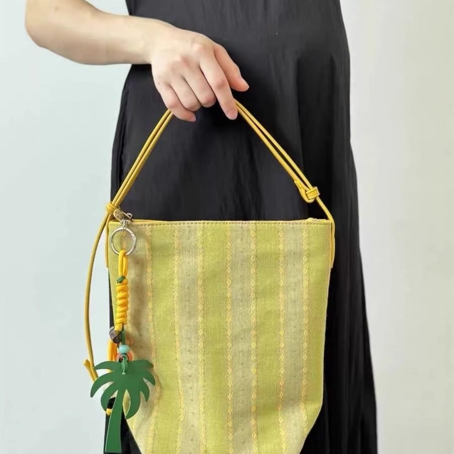 New high-end shoulder armpit bag casual versatile portable bucket bag retro loose canvas bag women