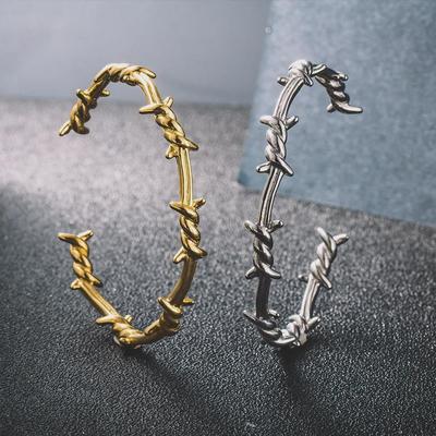 "Trendy Stainless Steel Thorn Wrapped Open Bracelet - Unisex Fashion"