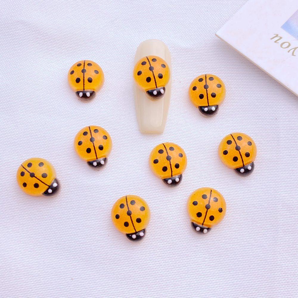 50 Stück Neue Süße Harz 8*10mm Mini Siebenstern Marienkäfer Serie Flache Rückseite Maniküre Teile Verzierungen Für Haarspangen Accessoires