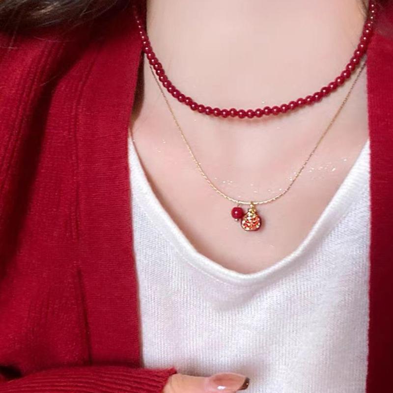 Elegant Pomegranate Necklace Symbolizing Abundance and Prosperity for Fashion Forward Women Seeking Unique Designs