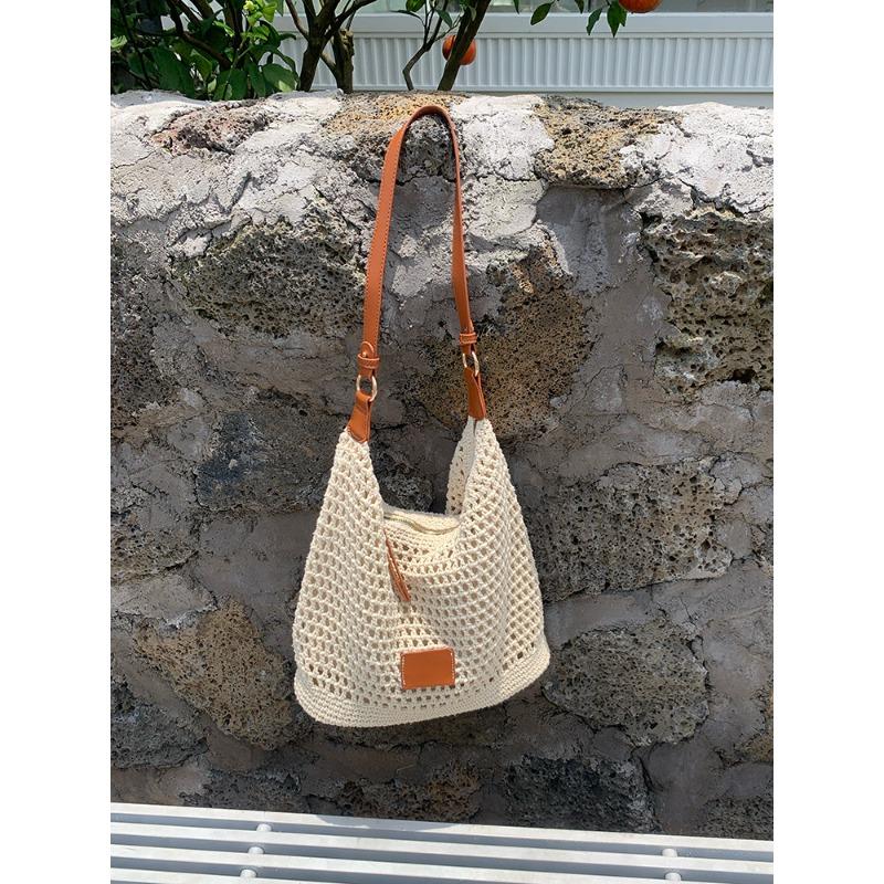 Woven hollow bag women's new summer seaside vacation travel tote bag beach bag shoulder armpit bag