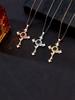 A cross pendant necklace perfect for everyday wear and holiday gifts