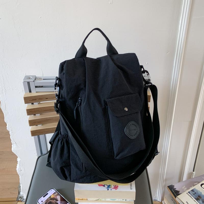 

Large capacity backpack simple women s new fashion messenger bag casual fabric men s shoulder backpack чёрный
