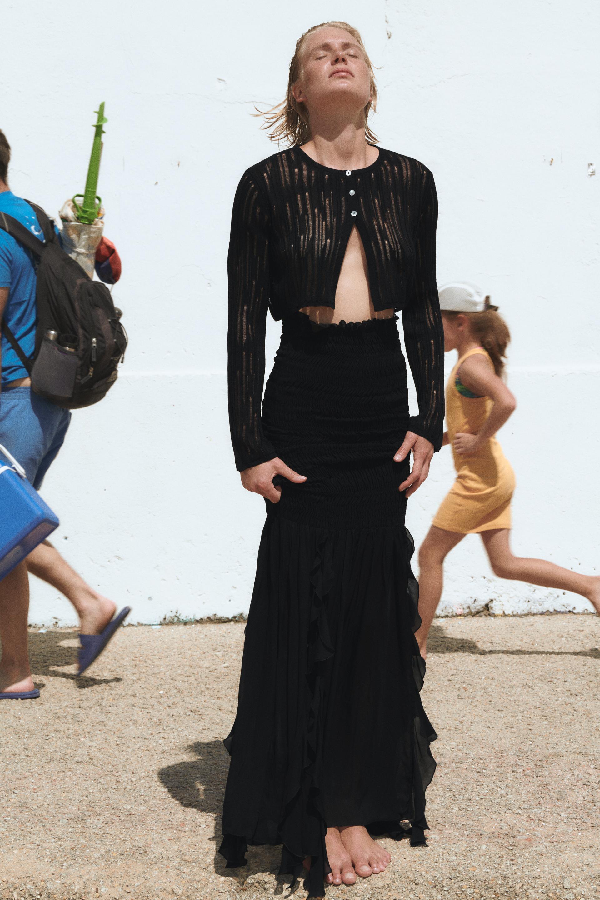 

УКОРОЧЕННЫЙ ТРИКОТАЖНЫЙ КАРДИГАН С РВАНАМИ