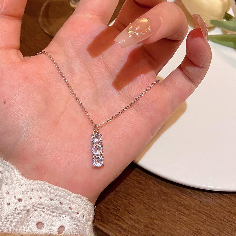 "Elegant Korean Titanium Steel Zircon Bow Necklace for Women"