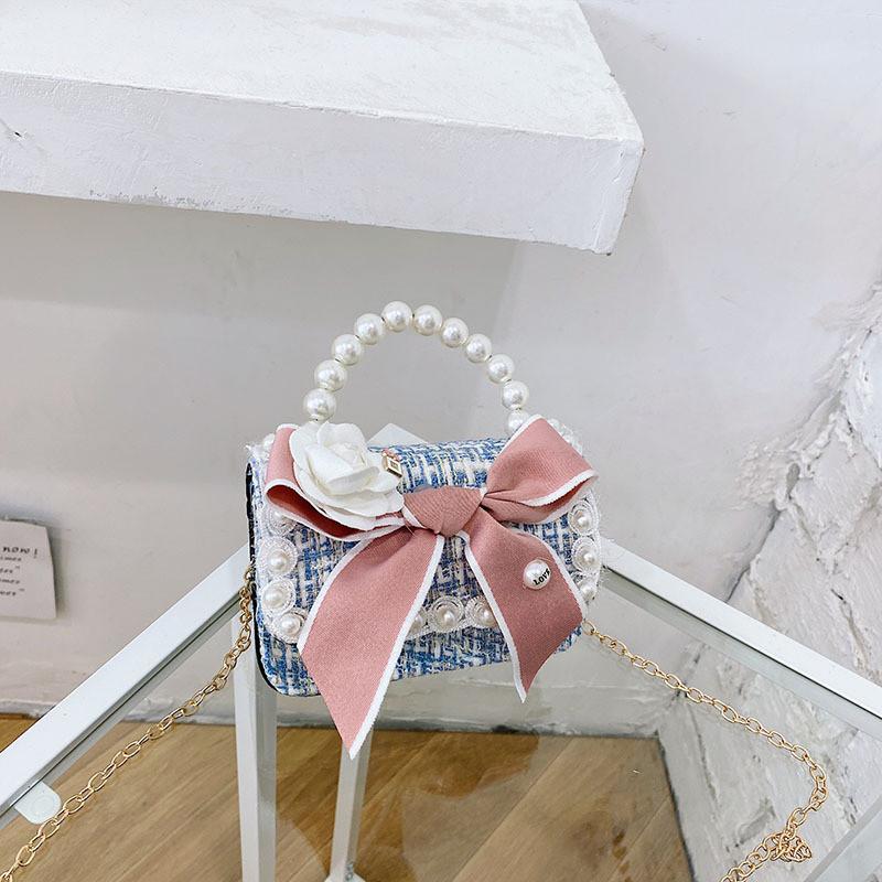 Stylish Mini Girls Handbag With Pearl Bow Design For Fashionable Princesses In Black And White Colors