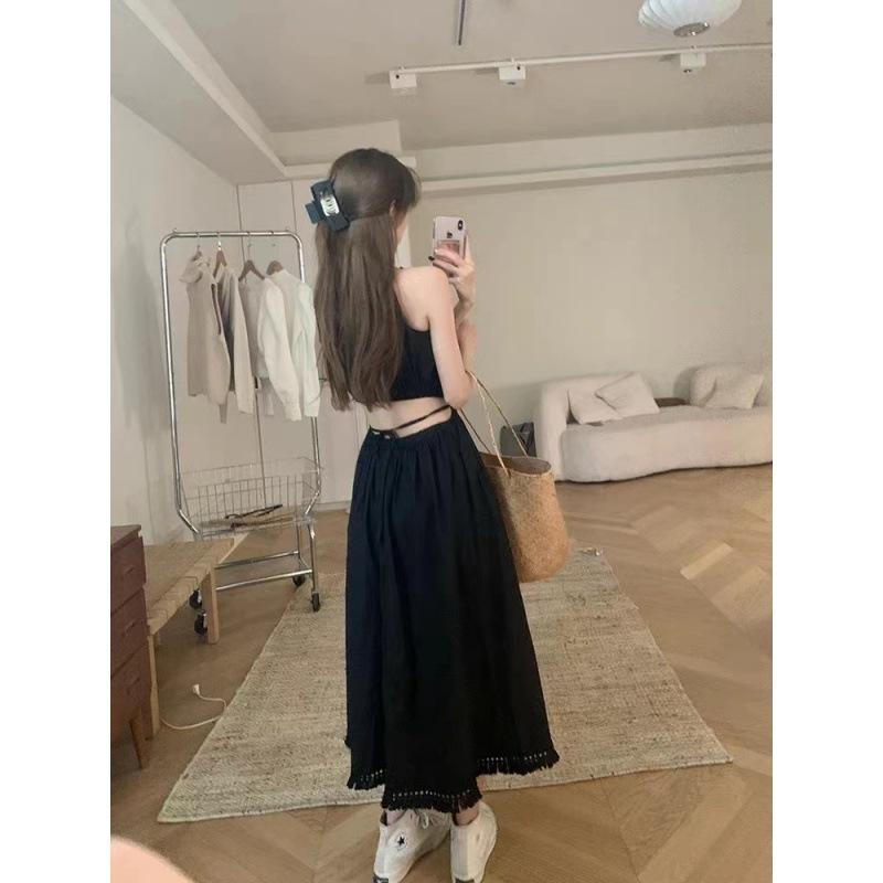 Design sense hollow waist hanging neck suspender dress women's summer lace-up waist thin holiday merry Suzhong long dress