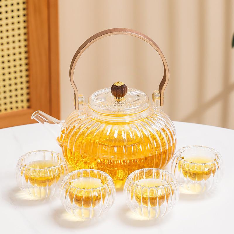 Pumpkin-Shaped High-Temperature Resistant Glass Teapot with Handle for Stove and Electric Ceramic Stove Heating.