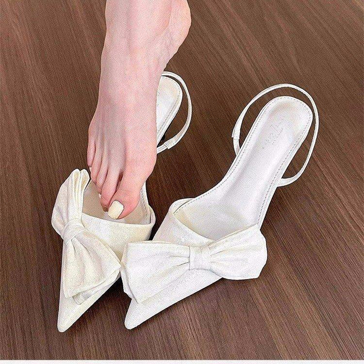 Europäischer und amerikanischer Stil Laufstegmodel, Metall-High-Heel-Sandalen 2024 neu Schleifendekoration spitze Zehenpartie Bag-Head-Sandalen Damen Oberbekleidung