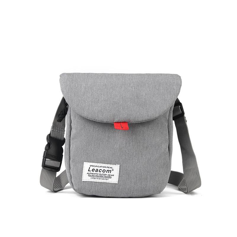 New men s single shoulder diagonal cross bag Korean version trendy cycling bag casual and fashionable men s small bag светло-серый