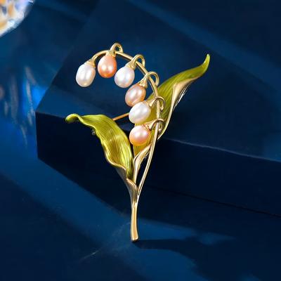 Broche émail rétro muguet Élégance féminine tempérament Broche perle Design de niche Pin Costume avec accessoires