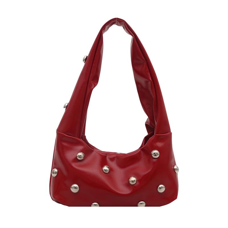 Internet celebrity armpit bag ladies 2025 new Korean version of fashion niche shoulder bag personalized rivets hand carry dumpling bag pu