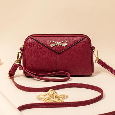 Nova Bolsa de Ombro em Couro PU Bolsa Pequena de Concha com Laço Bolsa Transversal Feminina em Couro Macio Nova Bolsa de Moda Europeia e Americana de Mão