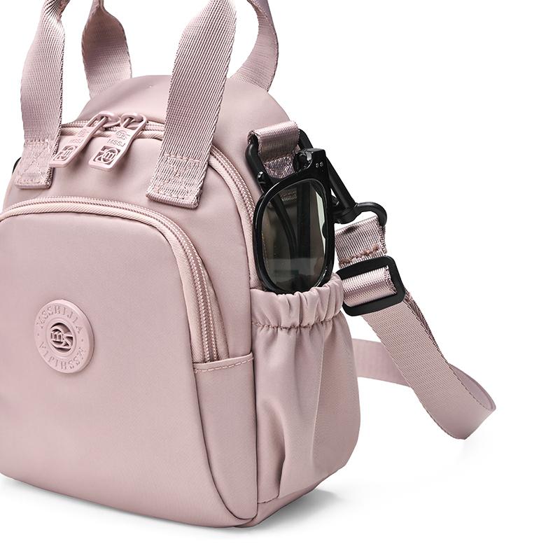 Kompakt Nylon Crossbody Miniryggsäck med Topphandtag Casual Liten Dagryggsäcksväska för Kvinnor Daglig Resa