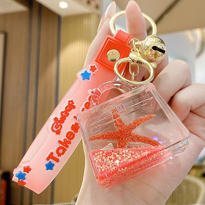 Starfish Quicksand Oil Keychain: Exquisite Pendant for Women's Bags, Students, and Kids - Cute Floating Schoolbag Decoration