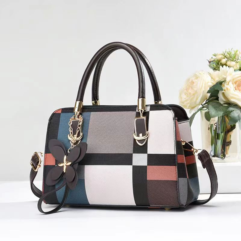Popular women's bags bag quality color matching handbag large capacity shoulder bag simple atmospheric bags commuting