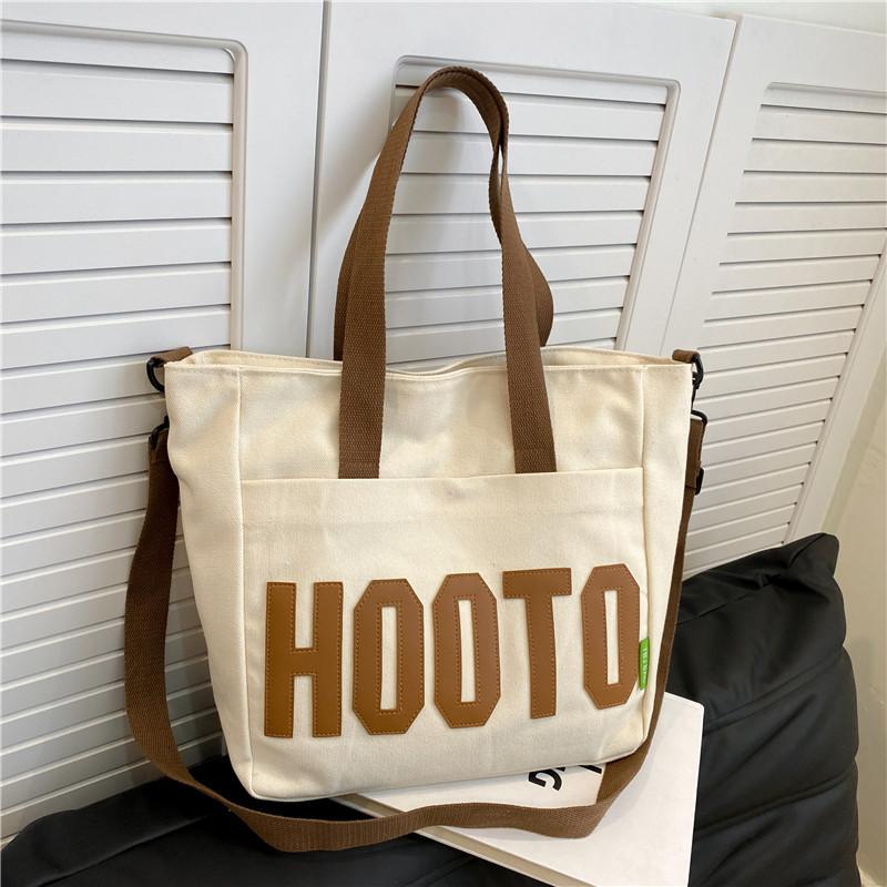 

Студенты колледжа на занятиях холщовая сумка через плечо большая сумка женская большая вместимость новая сумка-тоут для通勤 большая сумка