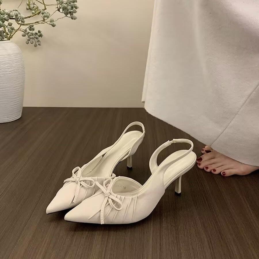 Nischen-Temperament High Heels Damen Frühling Schleife spitze Zehenpartie flacher Ausschnitt dünner Absatz Tasche Kopf Sandalen