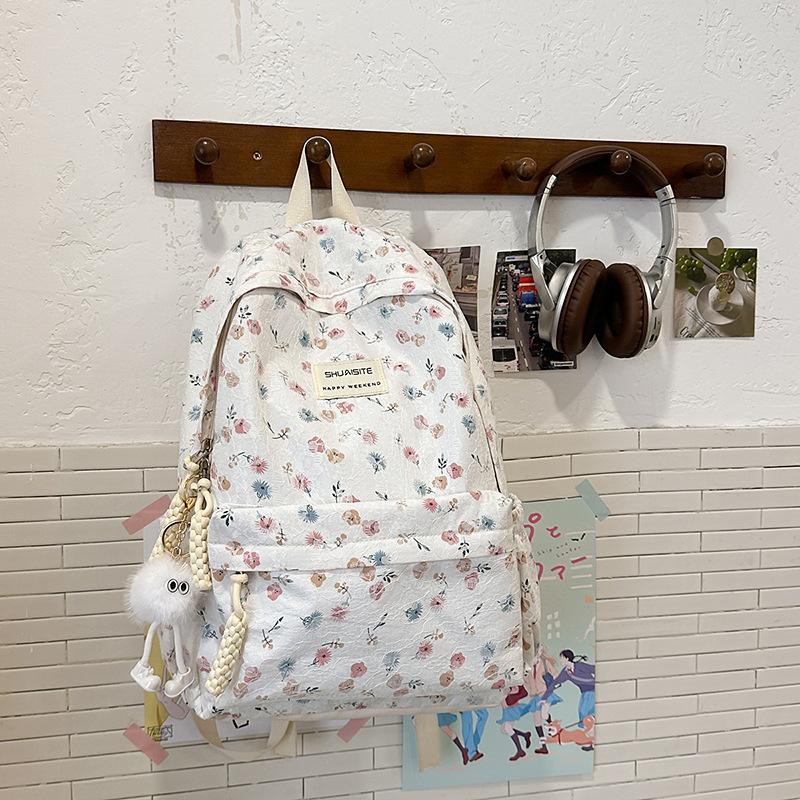New high-value Japanese schoolbag ins niche backpack girl college student versatile junior high school floral backpack
