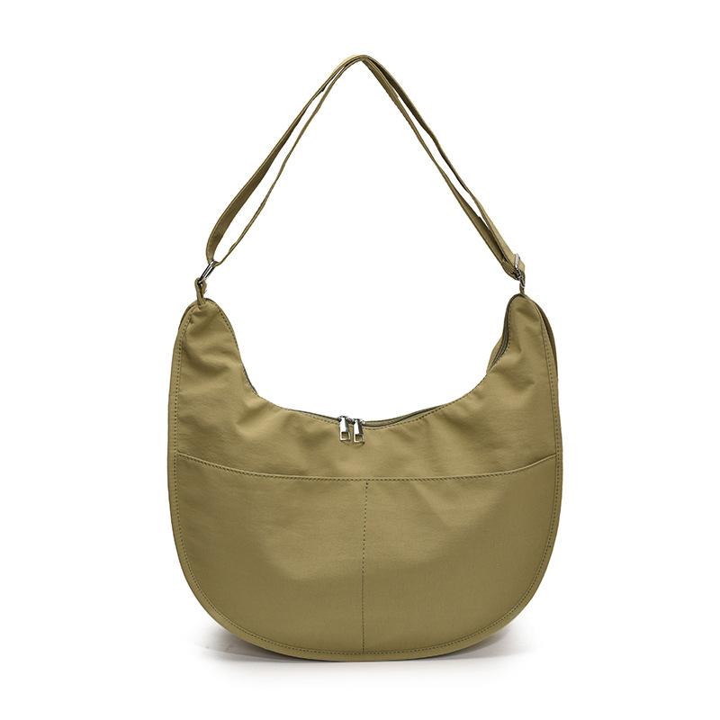 

В этом году популярны корейские версии однотонных сумок-пельменей в повседневном стиле.. Студенты ездят на занятия, универсальная и легкая дорожная сумка-мессенджер b хаки