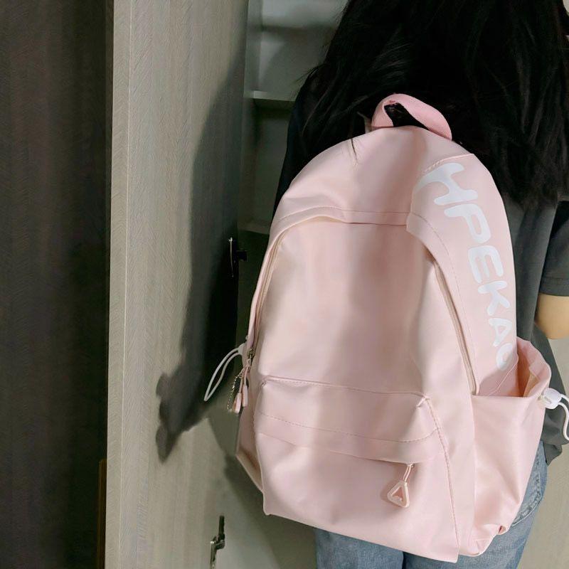 

Customized simple department versatile contrasting color letter backpack large capacity solid color backpack commuter schoolbag women s backpack Single bag without pendant