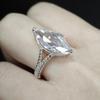 Elegant Pear-Shaped Zircon Ring with Diamond Accents - Women's Teardrop Design for Engagement or Wedding