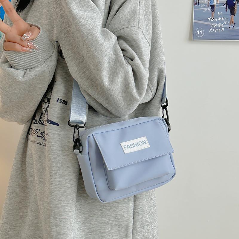 Nylon cloth messenger bag college student leisure sports small backpack single shoulder travel street Internet celebrity wide shoulder strap small