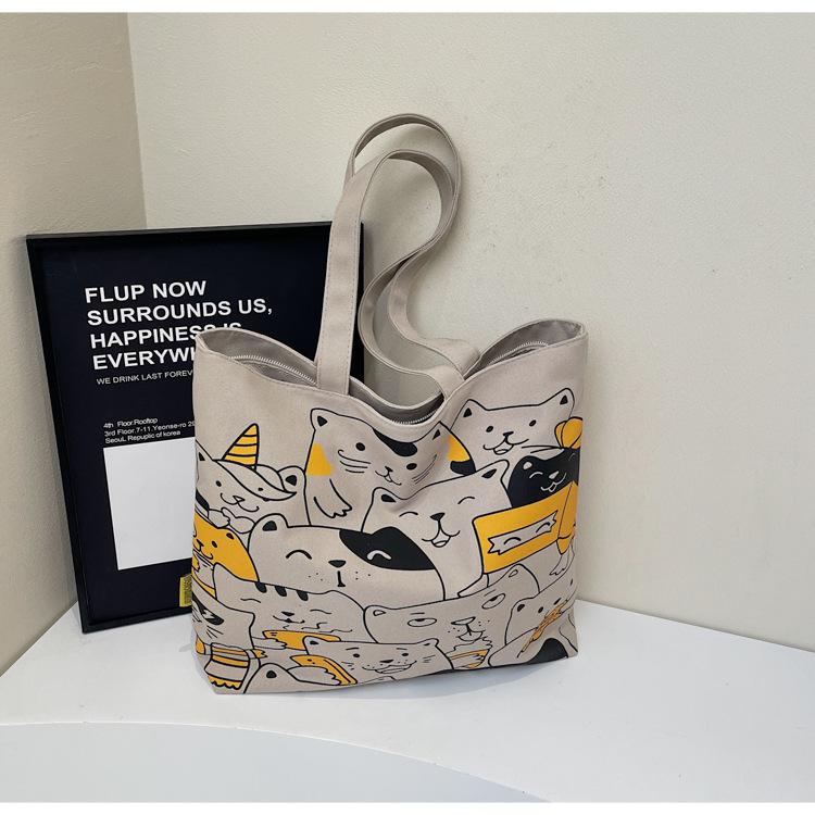 Tote bag women's new cartoon hand-held cloth bag large-capacity student commuting shoulder canvas bag