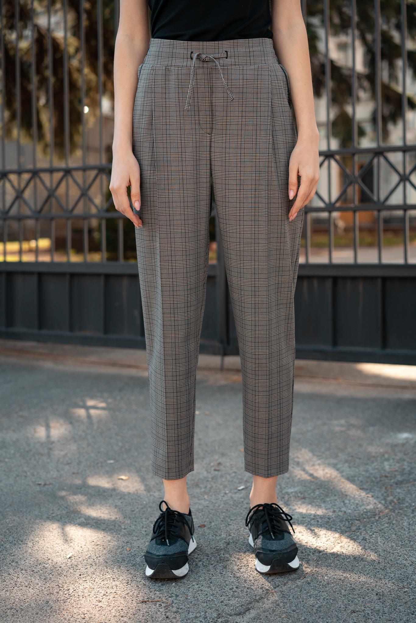 

Штани в клітку на гумці із зав язкою вкорочені 44 старий срібного кольору