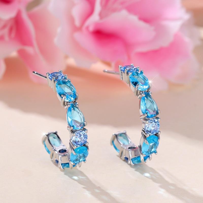 

European and American ins semi-round broken diamond crystal light sea blue zircon earrings, unpopular single light luxury small explosive earrings