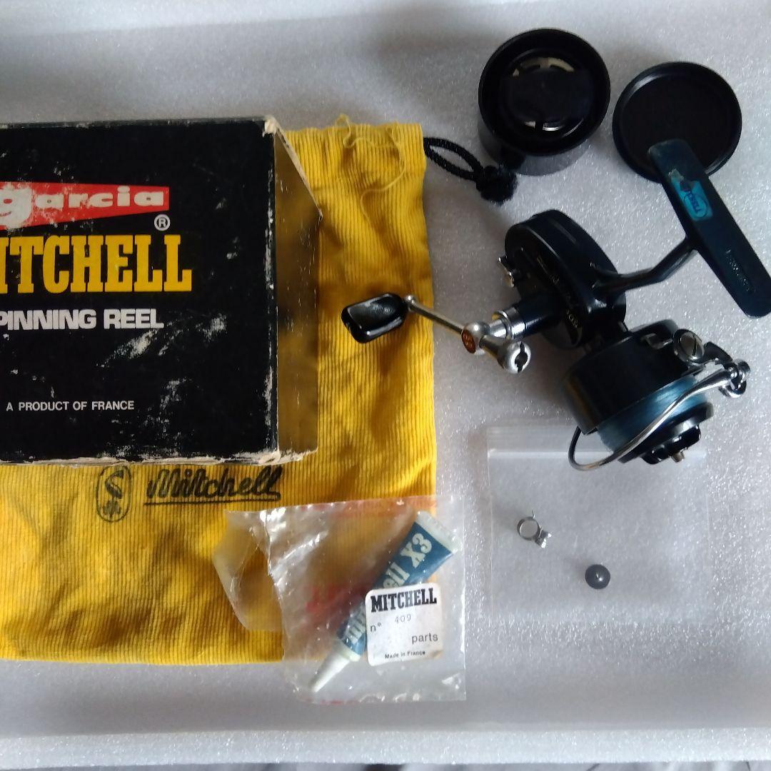 Used Mitchell 409 spinning reel right hand box, bag, genuine grease, spare spool included