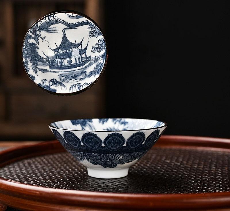 

Сине-белая фарфоровая чайная чашка ручной работы, с изображением дракона, феникса, рыбы, павильона, китайская чашка для кунг-фу, чайная посуда для церемонии, мастерские чашки Approx.50ML